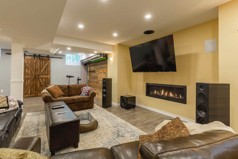 fireplace with tv & acoustic system in Toronto basement